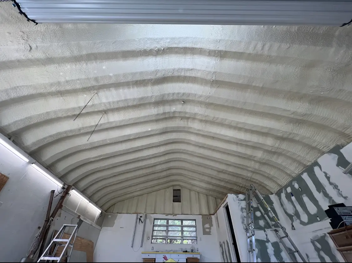 Spray polyurethane foam applied to the underside of a metal roof deck in Mount Carmel